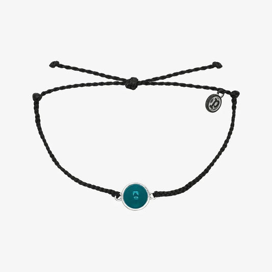 Pulsera con dijes de humor negro